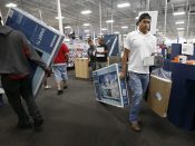 2016-11-24 22:10:56 epa05646396 People shop for televisions at the Best Buy store in Mesquite, Texas, USA, 24 November 2016. Best Buy and many other stores are opening on Thanksgiving Day, the day before Black Friday for shoppers. EPA/LARRY W. SMITH