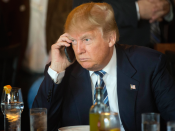 AP Photo/Matt Rourke Donald Trump listens to his mobile phone during a lunch stop in South Carolina.