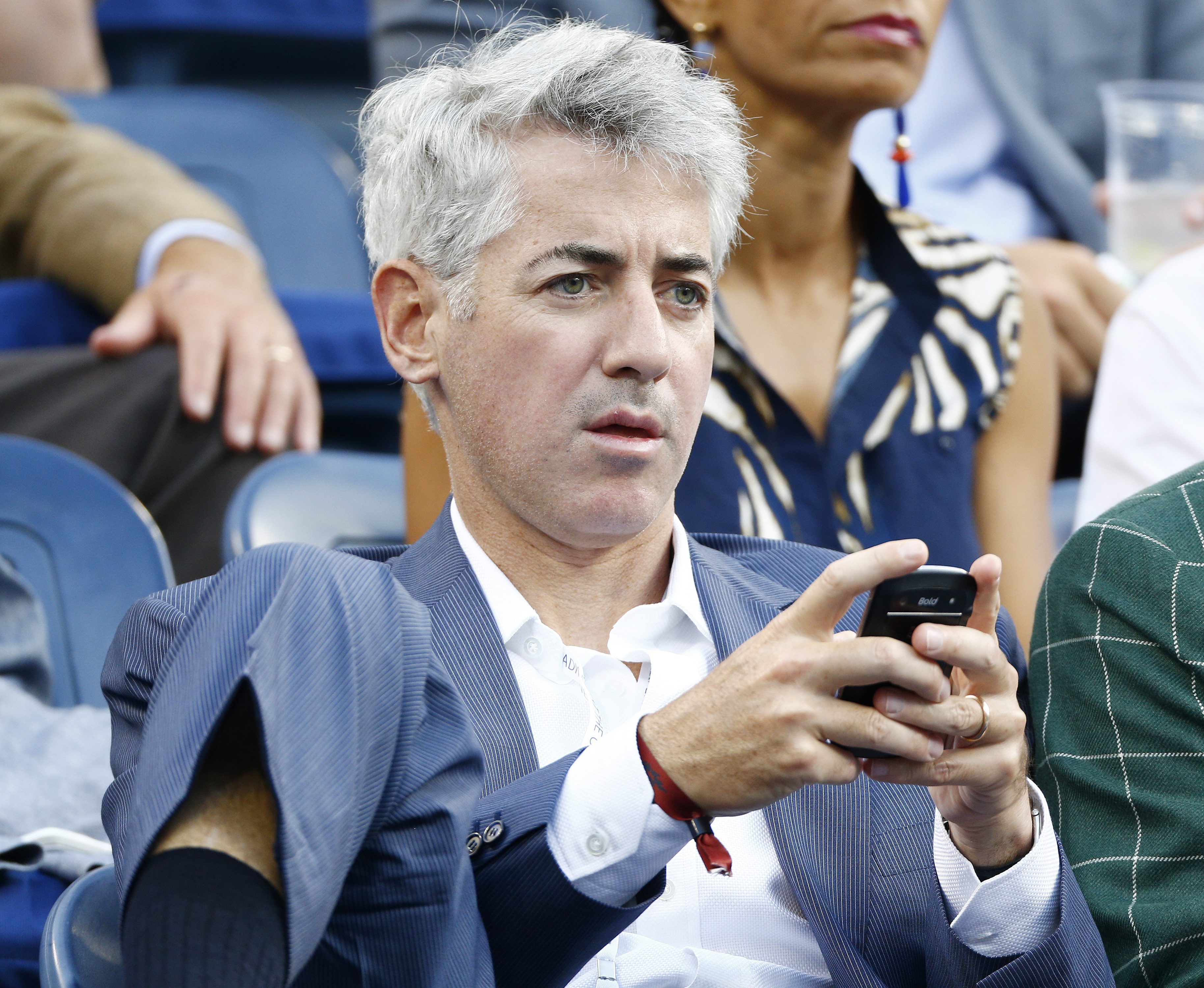 2014-09-03 16:10:30 epa04383090 Pershing Square Capital Management CEO Bill Ackman watches as Stan Wawrinka of Switzerland plays Kei Nishikori of Japan during their quarterfinals round match on the tenth day of the 2014 US Open Tennis Championship at the USTA National Tennis Center in Flushing Meadows, New York, USA, 03 September 2014. The US Open runs through 08 September, a 15-day schedule. EPA/ANDREW GOMBERT