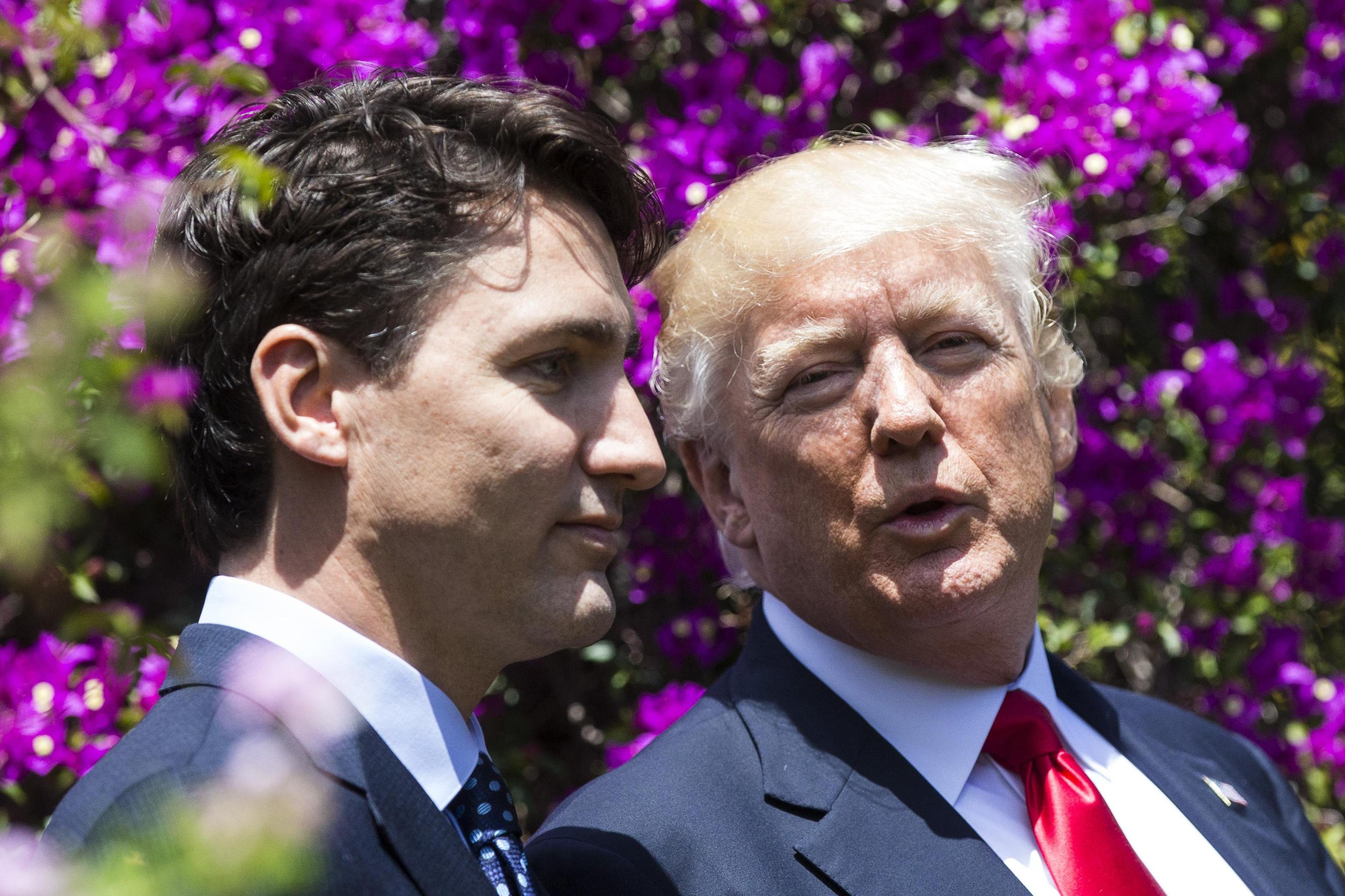 2017-05-27 08:31:48 epa05992916 US President Donald J. Trump (R) and Canadian Prime Minister Justin Trudeau (L) walk together after posing for a group photo on the second day of the G7 Summit at the Hotel San Domenico in Taormina, Sicily, Italy, 27 May 2017. The second day is scheduled to deal with Innovationand Development in Africa, Global Issues such as Human Mobility, Food Security and Gender Equality as well as the G7 Global Relations, the Italian G7 Presidency said in a media release. Heads of States and of Governments of the G7, the group of most industrialized economies, plus the European Union, meet in Taormina, Italy, from 26 to 27 May 2017 for a summit titled 'Building the Foundations of Renewed Trust'. EPA/ANGELO CARCONI