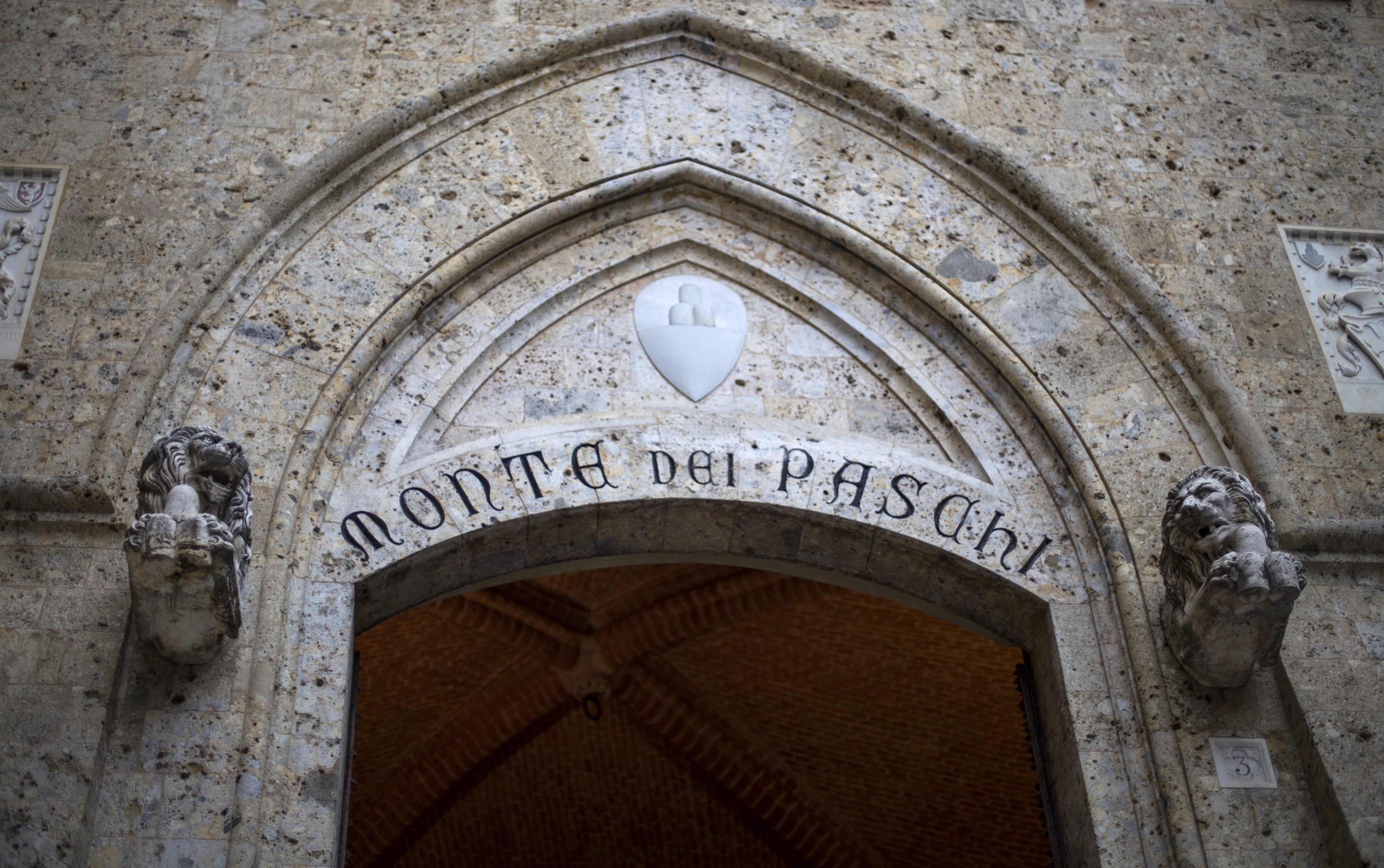 2016-03-23 22:19:13 epa05602059 (FILE) A file picture dated 23 March 2016 shows Banca Monte dei Paschi di Siena (BMPS or MPS) headquarters in Piazza Salimbeni, in Siena, Italy. MPS said in a statement on 25 October 2016, it would cut around 2,600 jobs and shut 500 branches as part of its reforming plans between the years 2016 to 2019. MPS board has called for an extraordinary shareholders' meeting on 24 November to approve a capital increase of 5 billion euro aimed to save the troubled Italian commercial bank. EPA/MATTIA SEDDA
