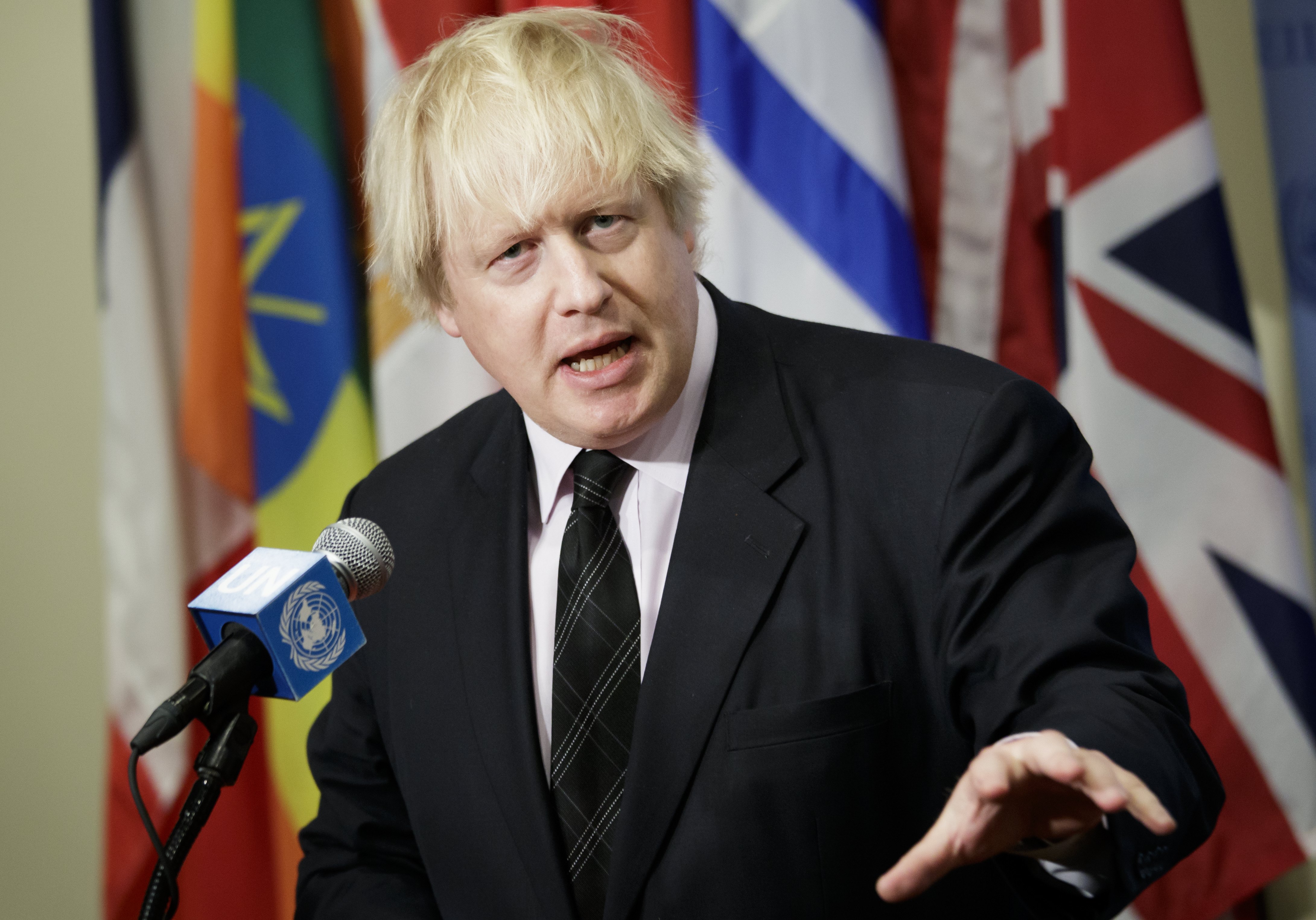 2017-03-23 12:31:10 epa05866248 Britain's Secretary of State for Foreign Affairs Boris Johnson talks with reporters at a press conference following a United Nations Security Council (UNSC) meeting at the United Nations (UN) headquarters in New York, New York, USA, 23 March 2017. EPA/JUSTIN LANE