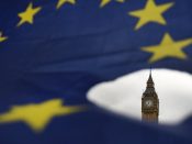 2017-03-29 12:51:21 epaselect epa05877014 A European Union flag during a demonstration against Brexit outside the Houses of Parliament in London, Britain, 29 March 2017. British Prime Minister Theresa May made a statement to Parliament officially triggering Article 50 formally begining Britain's departure from the European Union. Theresa May has signed the letter giving official notice under Article 50 of the Lisbon Treaty, which was delivered to European Council president Donald Tusk by the British ambassador to the EU, Sir Tim Barrow on 29 March 2017. EPA/ANDY RAIN