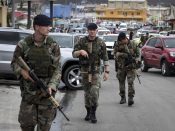 2017-09-07 16:42:50 epa06191559 A handout photo made available by the Dutch Department of Defense on 08 September 2017 shows Dutch soldiers patrolling in Philipsburg, Sint Maarten, on 07 September 2017. Dutch troops arrived at the island territory to help after Hurricane Irma was declared the most powerful hurricane ever recorded over the Atlantic Ocean, and left a path of destruction on Sint Maarten and in the Caribbean as it approaches Florida. Sint Maarten is an autonomous country of the Kingdom of the Netherlands on the Carbbean island of Saint Martin. EPA/GERBEN VAN ES/DUTCH DEPARTMENT OF DEFENSE/HANDOUT HANDOUT EDITORIAL USE ONLY/NO SALES