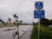 2017-09-09 08:24:47 epa06194313 A man walks along US 1 highway leading out of the Florida Keys as the weather conditions deteriorate from Hurricane Irma in Florida City, Florida, USA, 09 September 2017. Many areas are under mandatory evacuation orders as Irma approaches Florida. EPA/ERIK S. LESSER