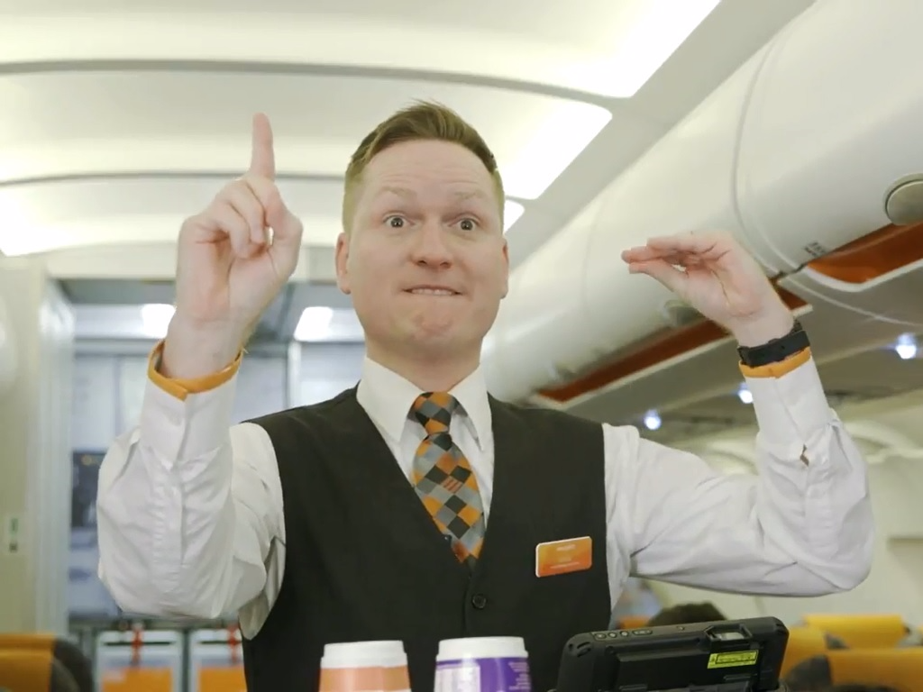 An EasyJet flight attendant signals for a croque monsieur.