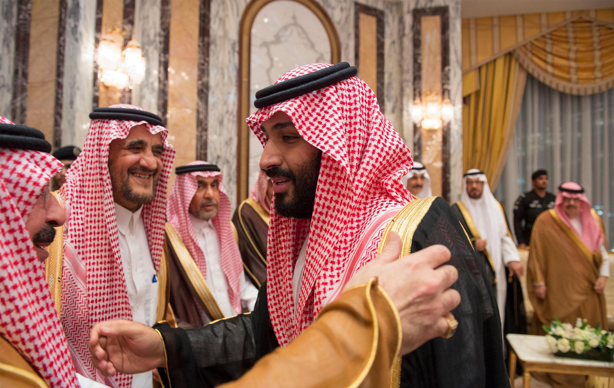 2017-06-21 00:00:00 epa06042289 A handout photo made available by the Saudi Press Agency (SPA) shows Crown Prince of Saudi Arabia Prince Mohammad bin Salman al-Saud (R) attending a ceremony to receive pledge of allegiance from princes, the Grand Mufti of the Kingdom of Saudi Arabia, President of the Shura Council, scholars, ministers, official and citizens at Safa Palace in Mecca, Saudi Arabia, 21 June 2017. King Salman bin Abdulaziz al-Saud issued a royal decree on 21 June 2017 changing the order of succession and promoting his 31-years old son Mohammad bin Salman to be the Crown Prince and deputy prime minister, beside his duties as defense minister, to replace Prince Mohammad bin Nayef al-Saud. 31 of the 34 members of the Saudi Royal Council approved of Prince Mohammad's promotion. EPA/SAUDI PRESS AGENCY HANDOUT HANDOUT EDITORIAL USE ONLY/NO SALES