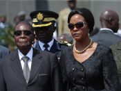 2017-08-26 00:00:00 epa06330456 (FILE) - Zimbabwean President Robert Mugabe (L) accompanied by his wife Grace (R) arrive at the National Heroes Acre in Harare, Zimbabwe, 26 August 2017 (reissued 15 November 2017). The Zimbabwe National Army (ZNA) has reportedly taken control over the government of President Robert Mugabe. The army seized the national broadcaster's headquarters (ZBC) on 14 November night, to announce that President Mugabe and his family were safe but without citing their whereabouts. The military denied it staged a coup d'etat. EPA/AARON UFUMELI