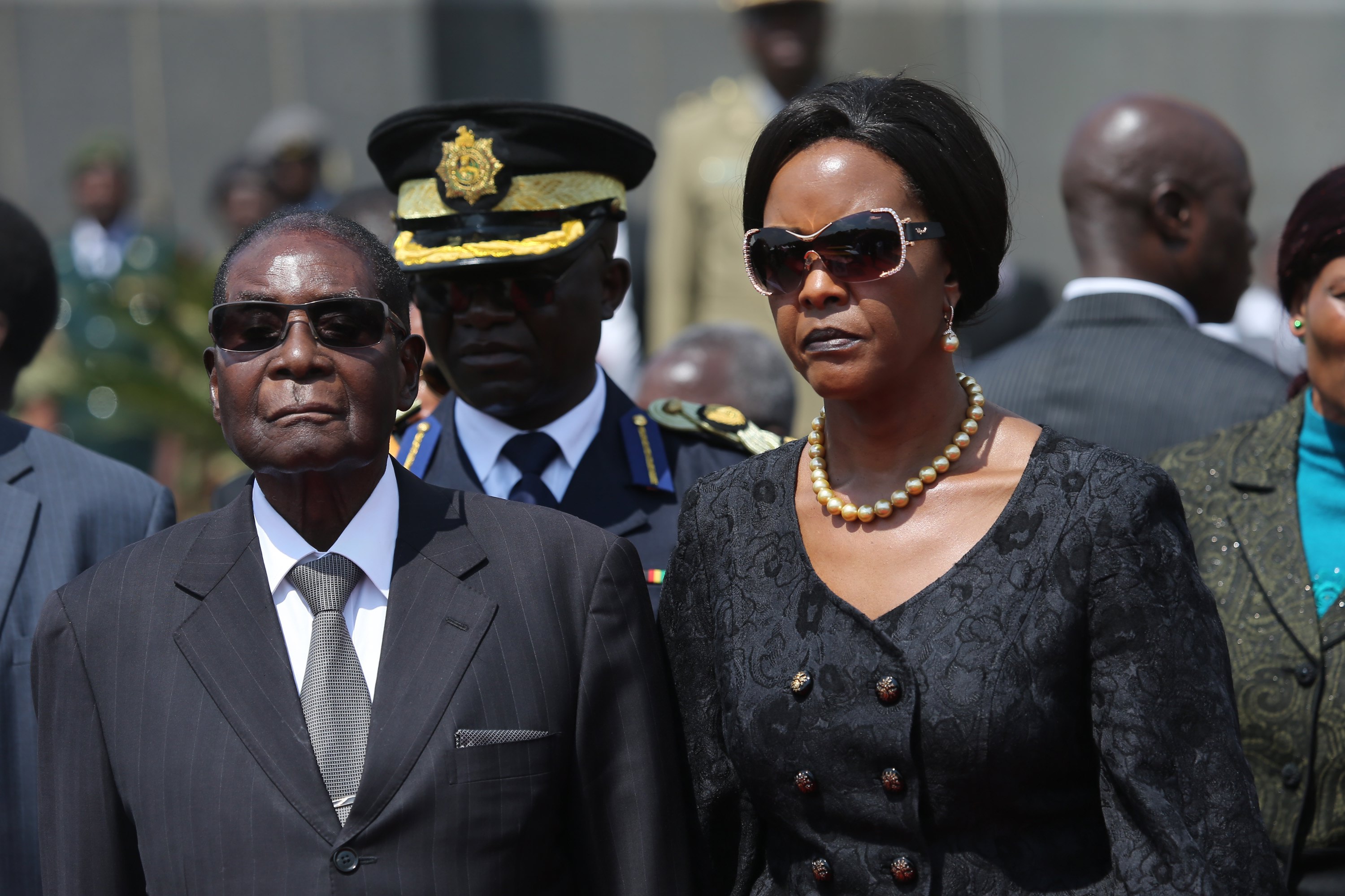 2017-08-26 00:00:00 epa06330456 (FILE) - Zimbabwean President Robert Mugabe (L) accompanied by his wife Grace (R) arrive at the National Heroes Acre in Harare, Zimbabwe, 26 August 2017 (reissued 15 November 2017). The Zimbabwe National Army (ZNA) has reportedly taken control over the government of President Robert Mugabe. The army seized the national broadcaster's headquarters (ZBC) on 14 November night, to announce that President Mugabe and his family were safe but without citing their whereabouts. The military denied it staged a coup d'etat. EPA/AARON UFUMELI