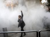 2017-12-30 17:11:35 epa06412625 (FILE) - Iranian students clash with riot police during an anti-government protests around the Tehran University in Tehran, Iran, 30 December 2017. Media reported on 01 January 2018 that the anti-regime protests in Iran are continuing. According to Iranian state television on 01 January 2018, ten demonstrators have reportedly died during the current protests. EPA/STR