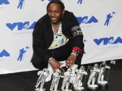 2017-08-27 20:31:13 epa06167826 US rapper Kendrick Lamar poses with his awrds for Video of the Year, Best Hip Hop, Best Cinematography, Best Direction, Best Art Direction, Best Visual Effects for 'Humble' in the press room at the 34th MTV Video Music Awards (VMA) at The Forum in Inglewood, California, USA, 27 August 2017. *** Local Caption *** 52990027 EPA/MIKE NELSON *** Local Caption *** 52990027