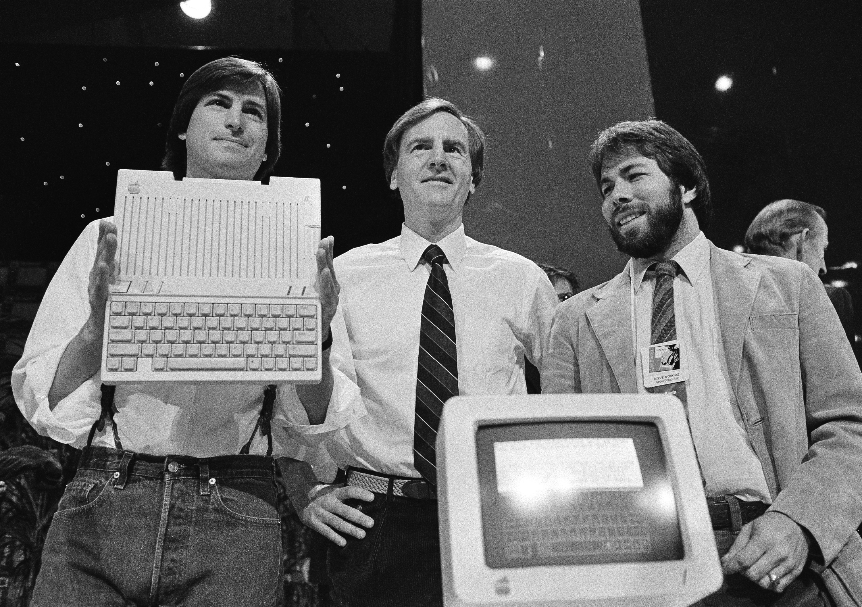 Steve Jobs, John Sculley en Steve Wozniak in 1984.