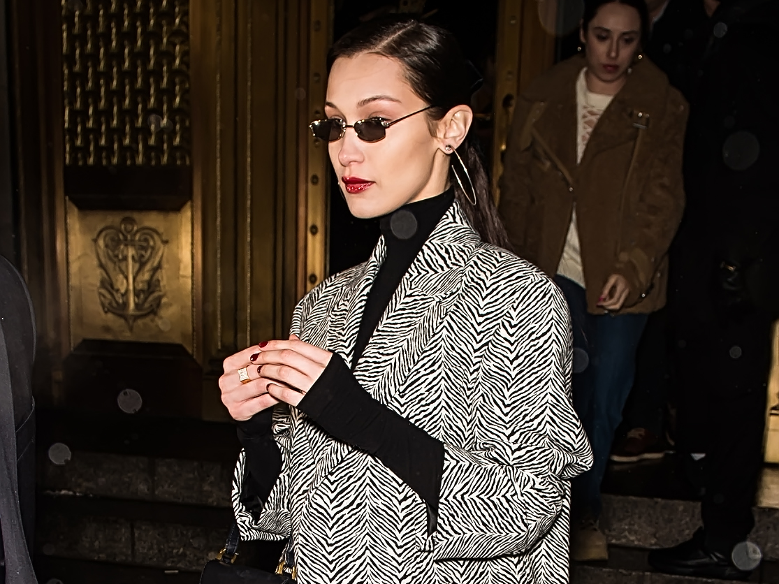 Bella Hadid wore a zebra-print jacket with tiny sunglasses that