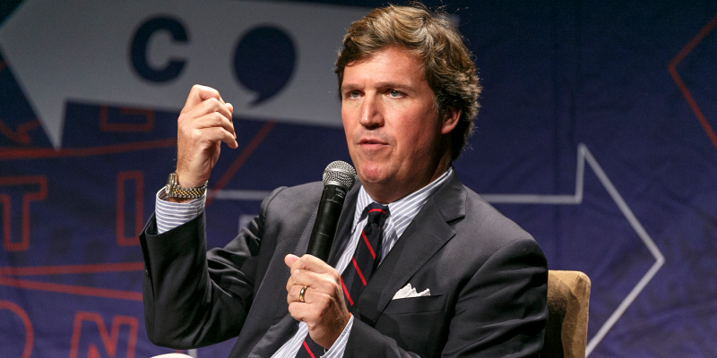 Tucker Carlson apologizes for vulgar language during interview but says ...