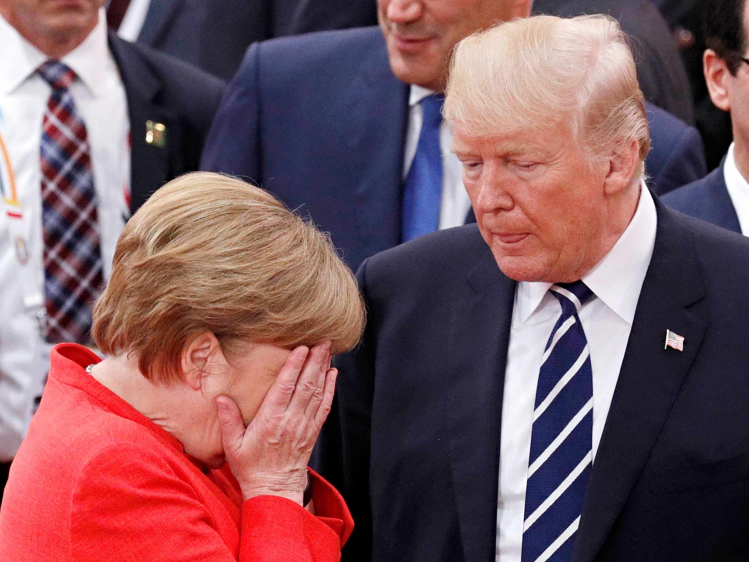 Donald Trump en Angela Merkel. Foto: Philippe Wojazer/EPA