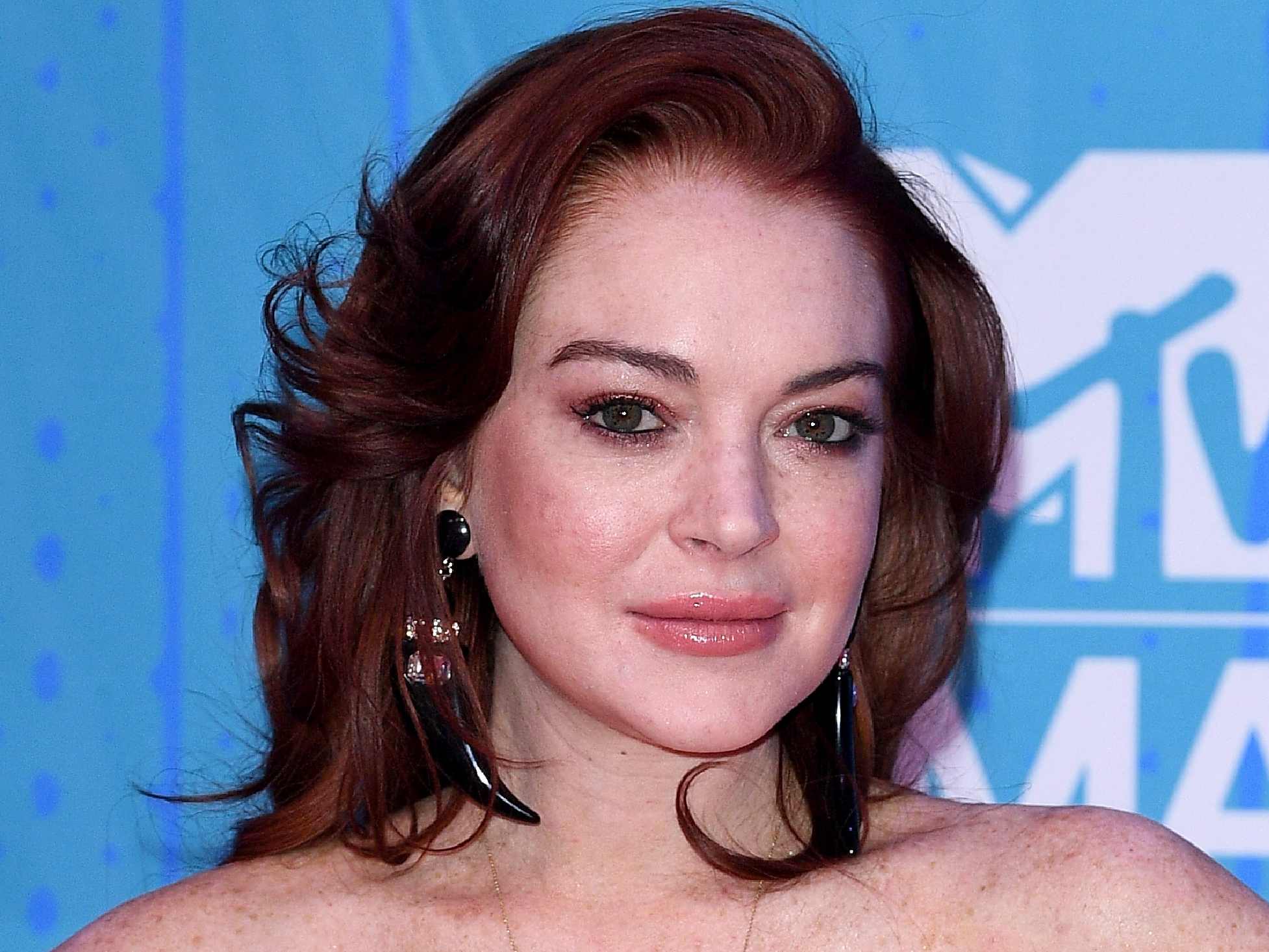 Lindsay Lohan posted a confident nude selfie for her 33rd birthday, and  fans are celebrating her