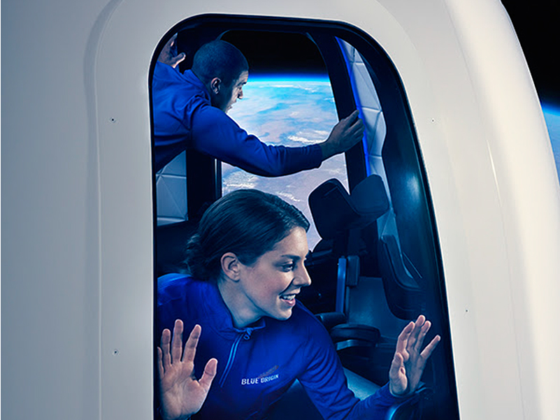 Zo zullen de passagiers van de New Shepard dinsdag naar de aarde en de ruimte kunnen kijken. Foto: Blue Origin