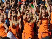 Vrouwelijke Oranjefans in een Bavariajurkje tijdens het WK voetbal 2010 in Zuid-Afrika.