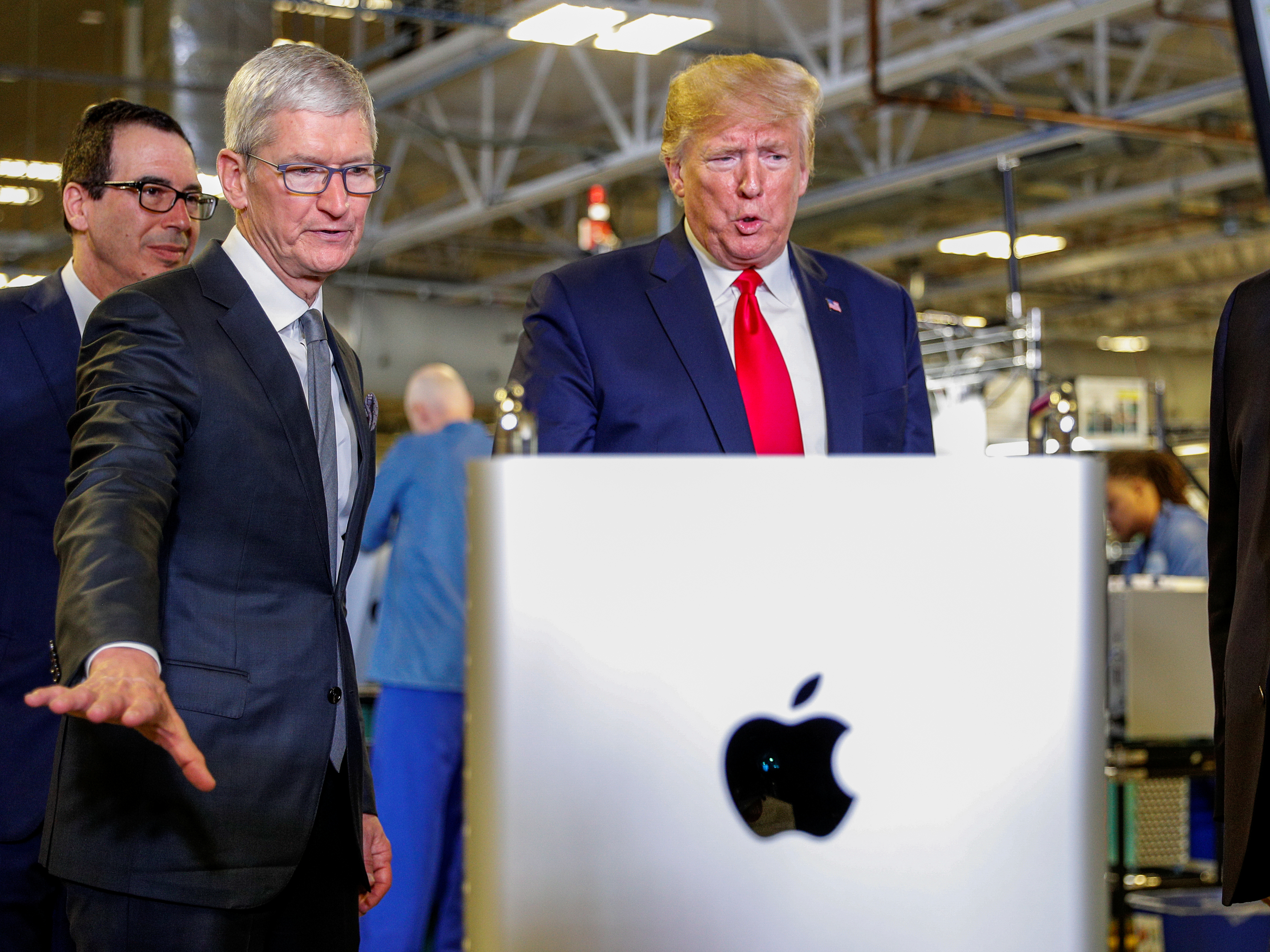 Apple-topman Tim Cook en de Amerikaanse president Donald Trump