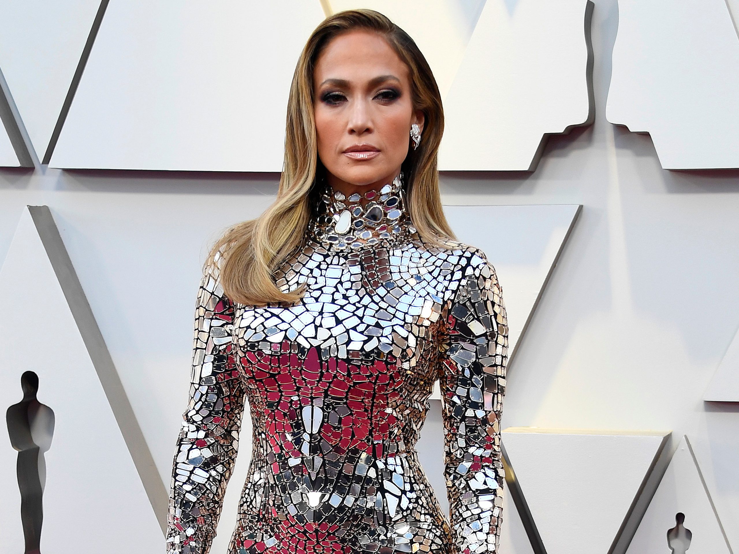 Jennifer Lopez Wears Red Outfit With Sparkly Coffee Cup to the Gym