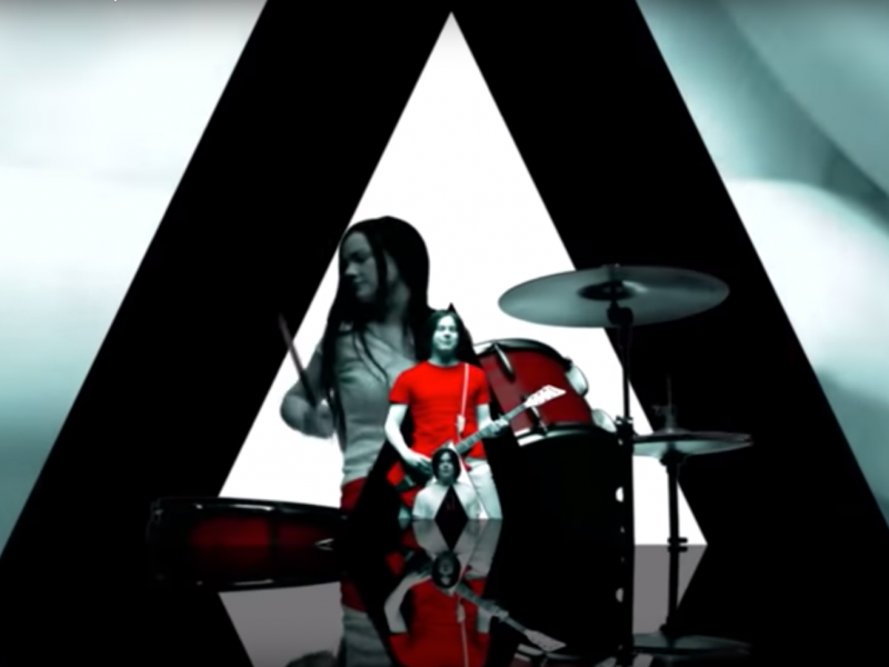 The white stripes seven nation. Seven Nation Army Джек Уайт. Seven Nation Army исполнитель. Seven Nation Army певец. Jack White Seven Nation Army.