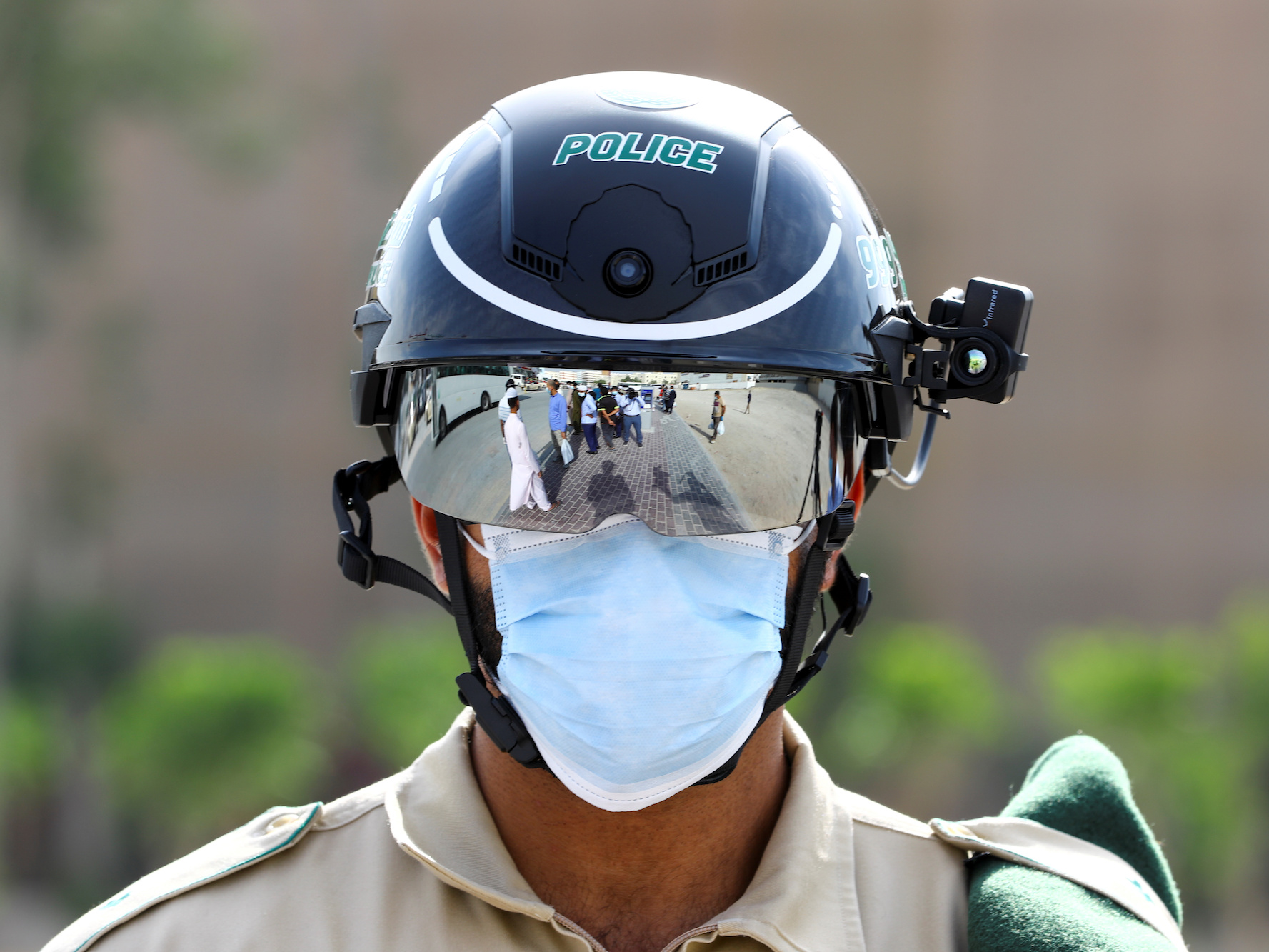 Police in China, Dubai, and Italy are using these surveillance helmets to scan people for COVID-19 fever as they walk past and it may be our future normal