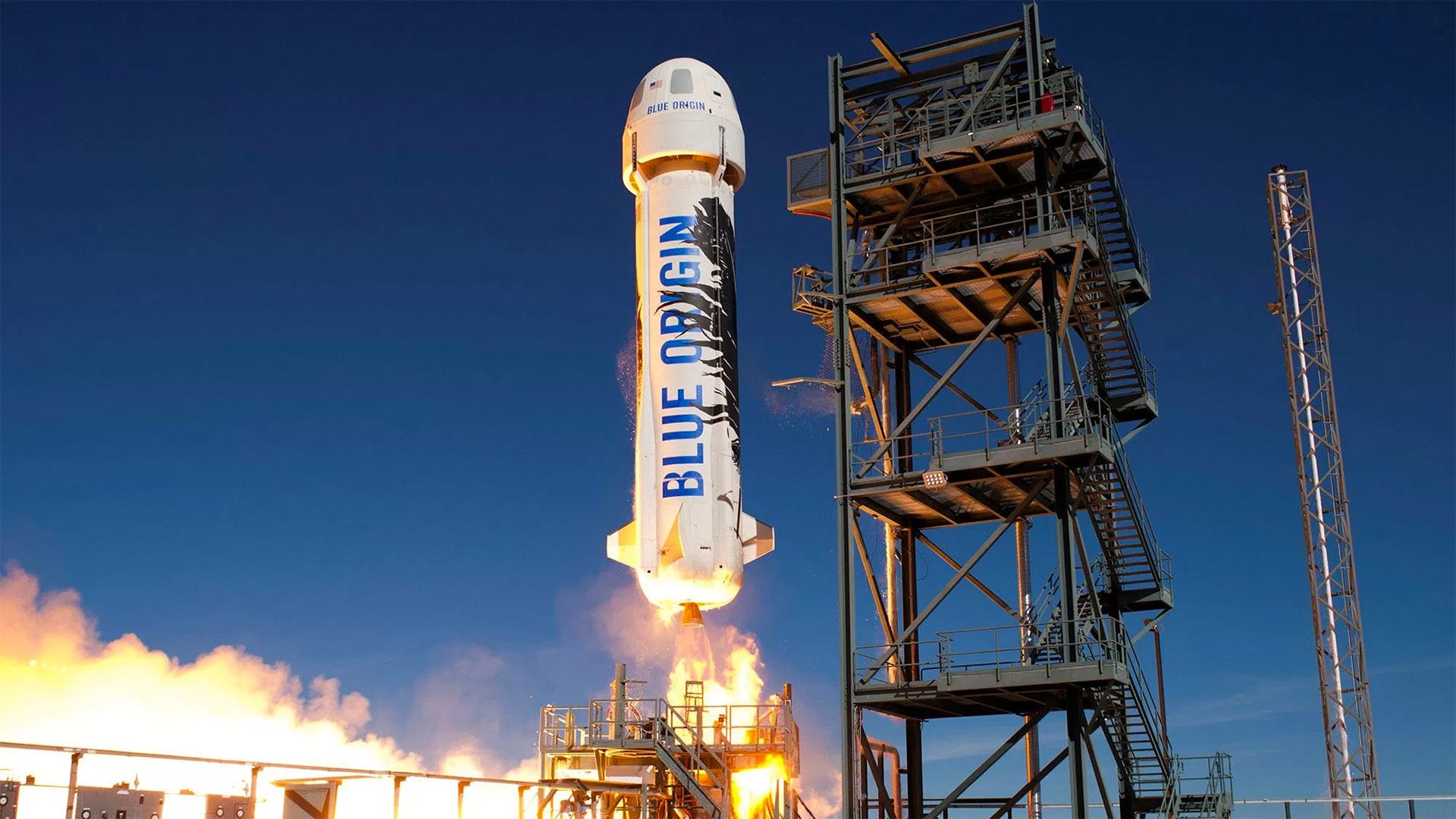 Een New Shepard-raket vliegt in 2016 naar de ruimte op een succesvolle missie. Foto: Blue Origin