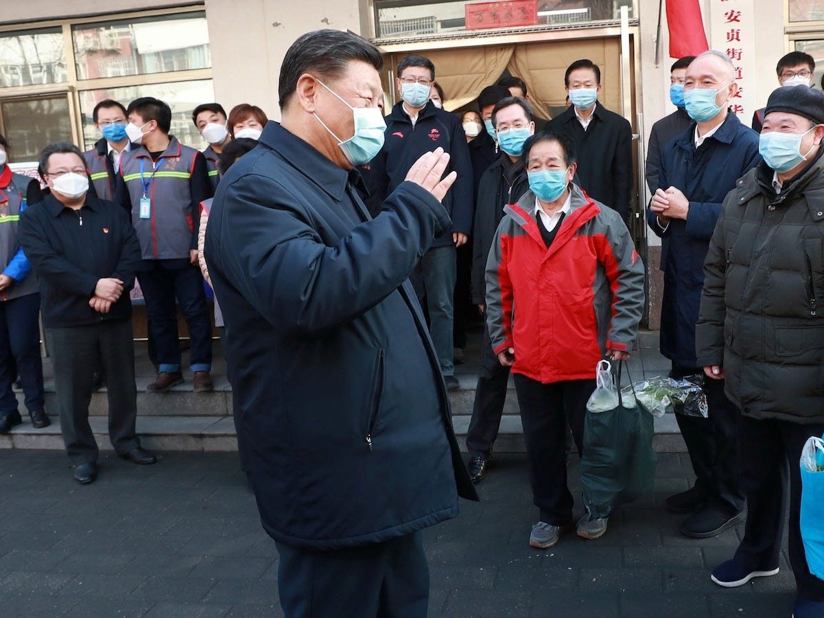 De Chinese president Xi Jinping inspecteert de controlewerkzaamheden in Beijing