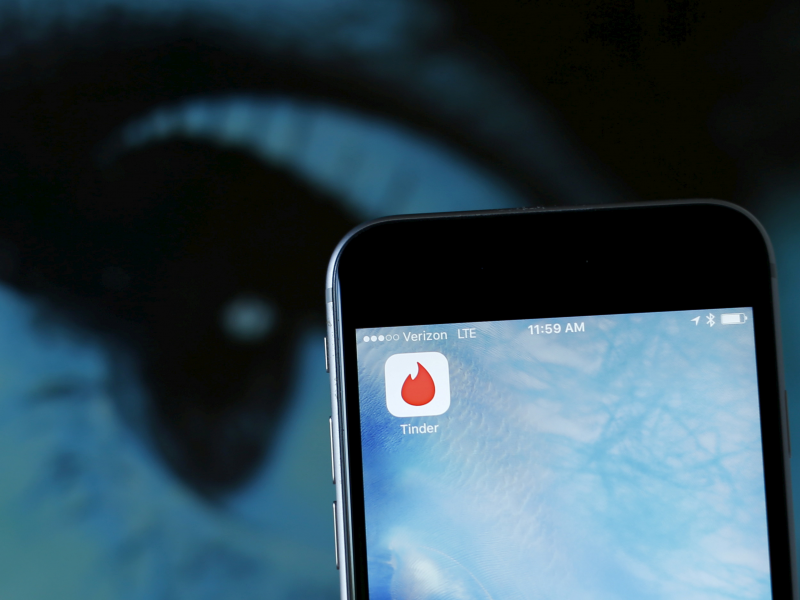 The dating app Tinder is shown on an Apple iPhone in this photo illustration.  REUTERS/Mike Blake/Illustration/File Photo