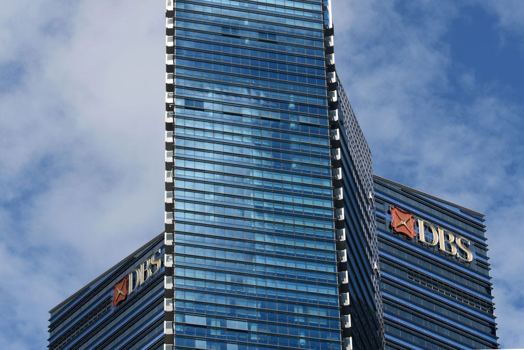 The DBS Bank logo is seen on a building in the Marina Bay Financial Centre in Singapore on June 19, 2020.