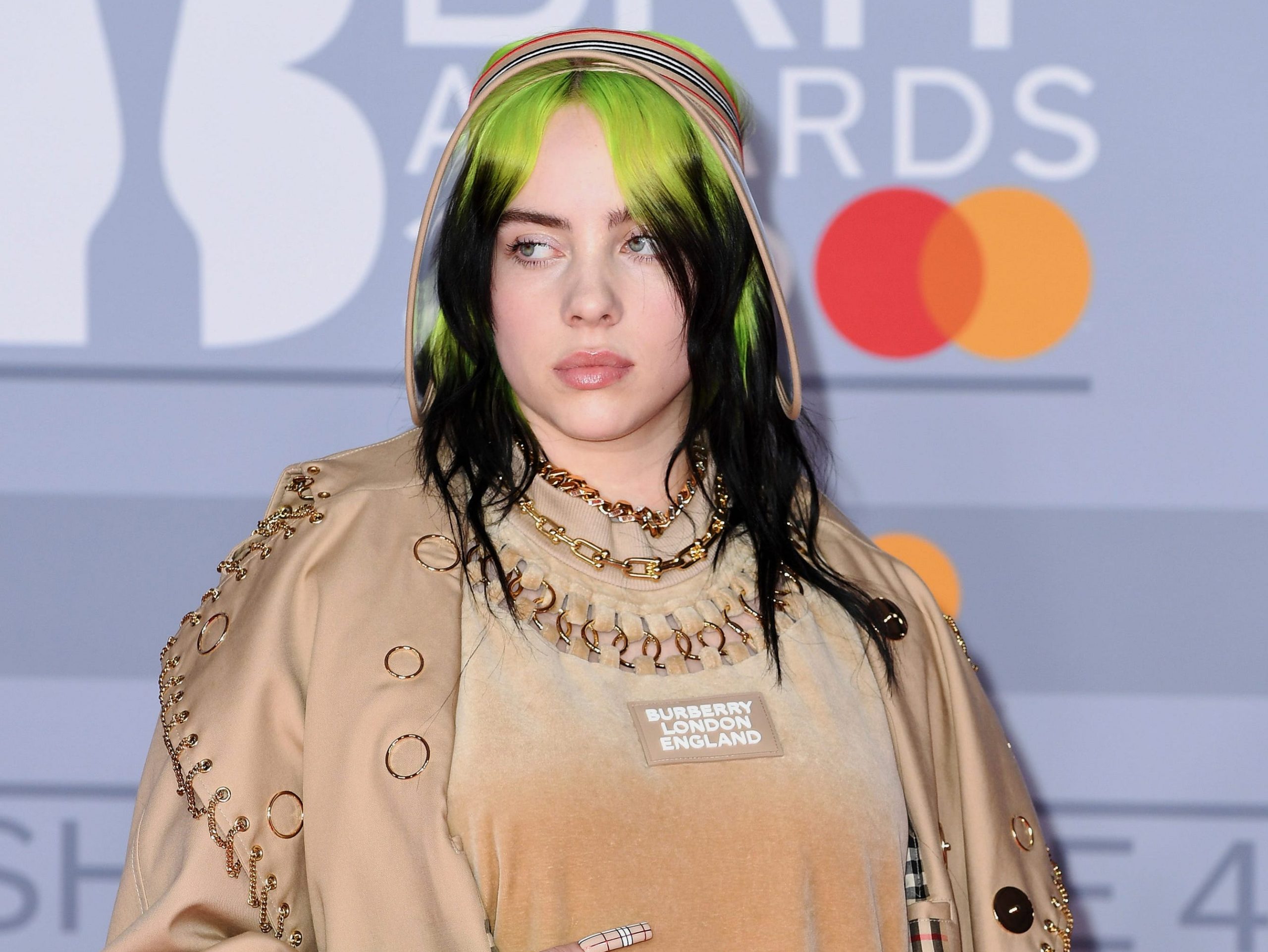 Billie Eilish jokes 'the whole internet is gaslighting me' because people  think her sneakers are pink and white