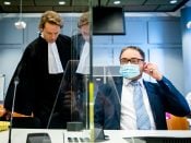 Horecaondernemer Michael Meeuwisse (R) en advocaat Simon van Zijl in de rechtbank.