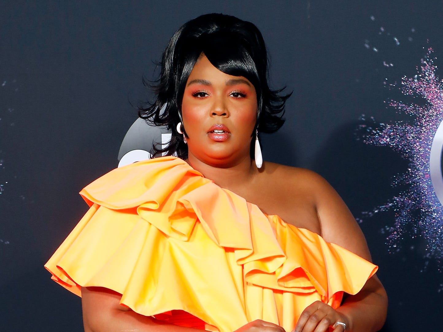 Celebrity Gossip & News | Lizzo Really Showed Up to the AMAs Looking Like  Wealth and Success | POPSUGAR Celebrity UK Photo 12