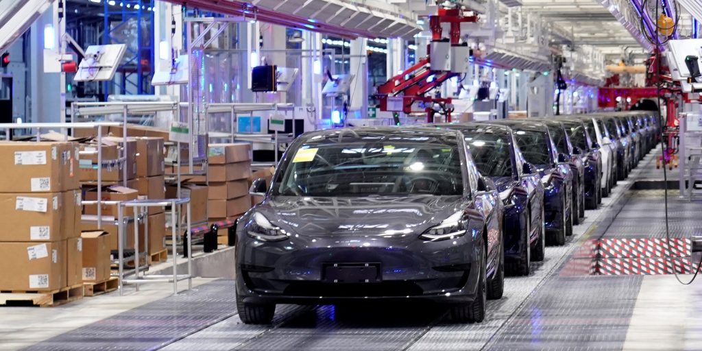 Tesla China-made Model 3 vehicles are seen during a delivery event at its factory in Shanghai.