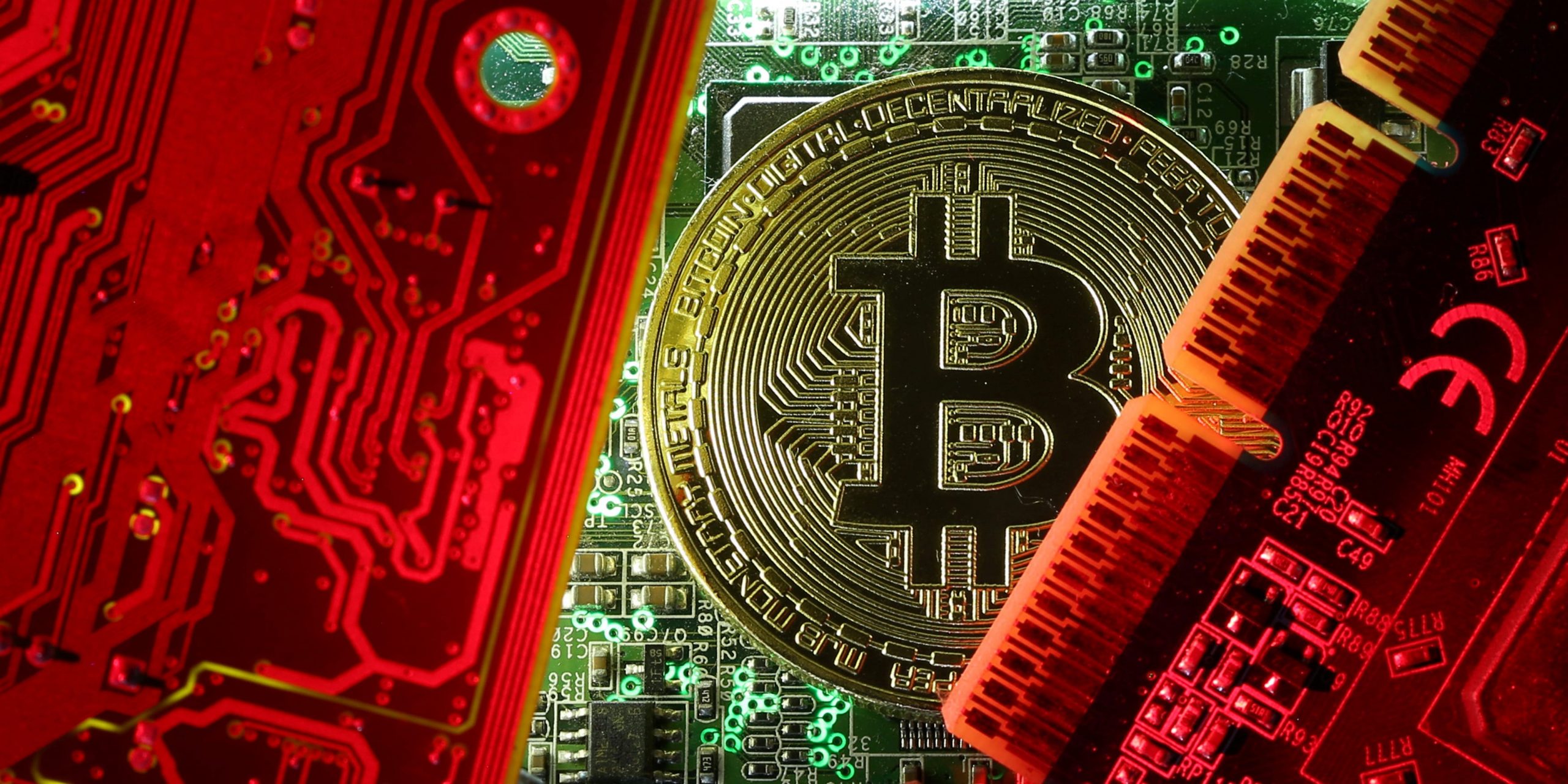 FILE PHOTO: A copy of bitcoin standing on PC motherboard is seen in this illustration picture, October 26, 2017. REUTERS/Dado Ruvic/File Photo