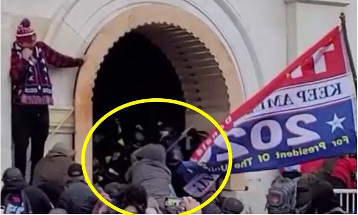 Foy allegedly striking police officers with a hockey stick