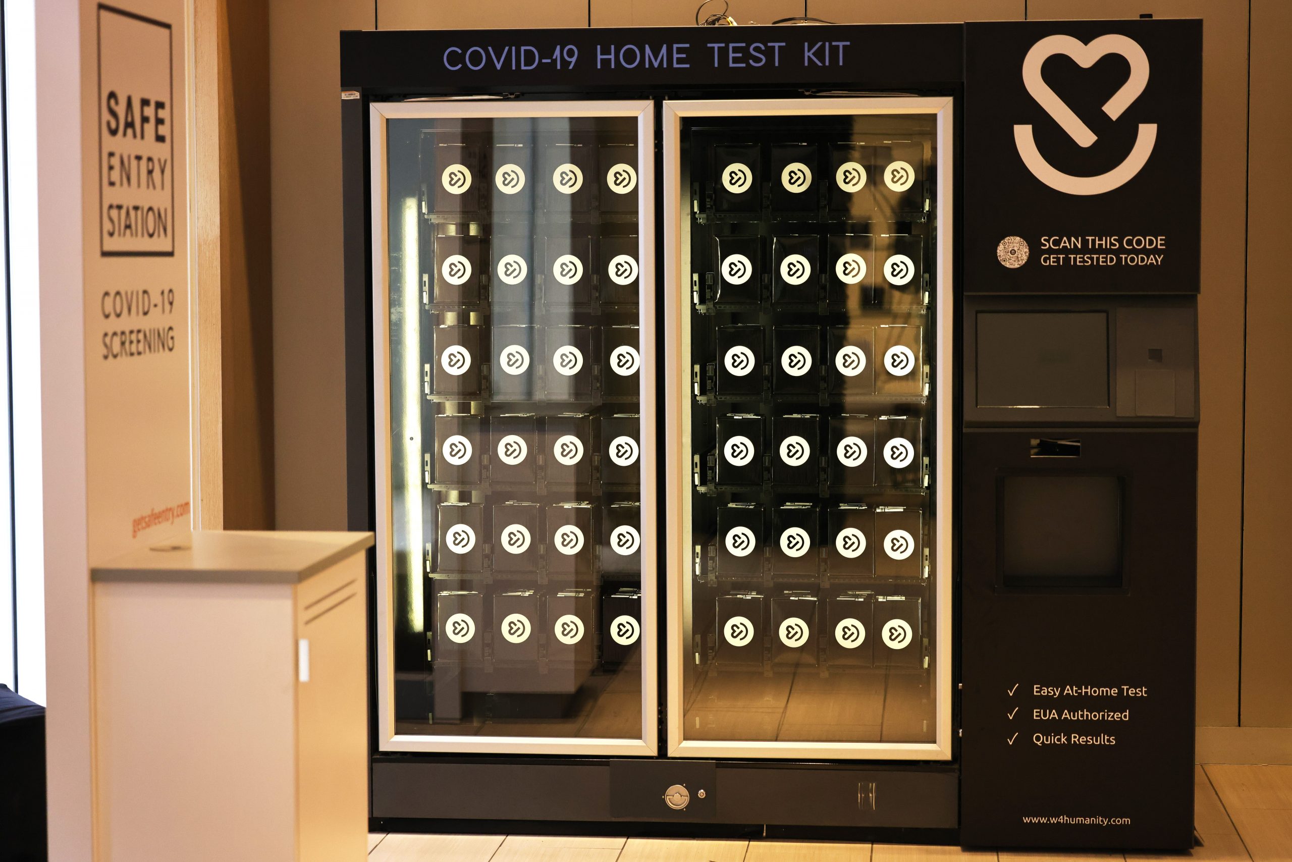 A Wellness 4 Humanity COVID-19 at-home test kit vending machine is seen on January 27, 2021 in New York City. Wellness 4 Humanity, a group of science- and medical-focused social entrepreneurs, introduced the first vending machines for coronavirus (COVID-19) at-home test kits in New York City. The kits will soon be available throughout NYC as well as other major cities in the country.