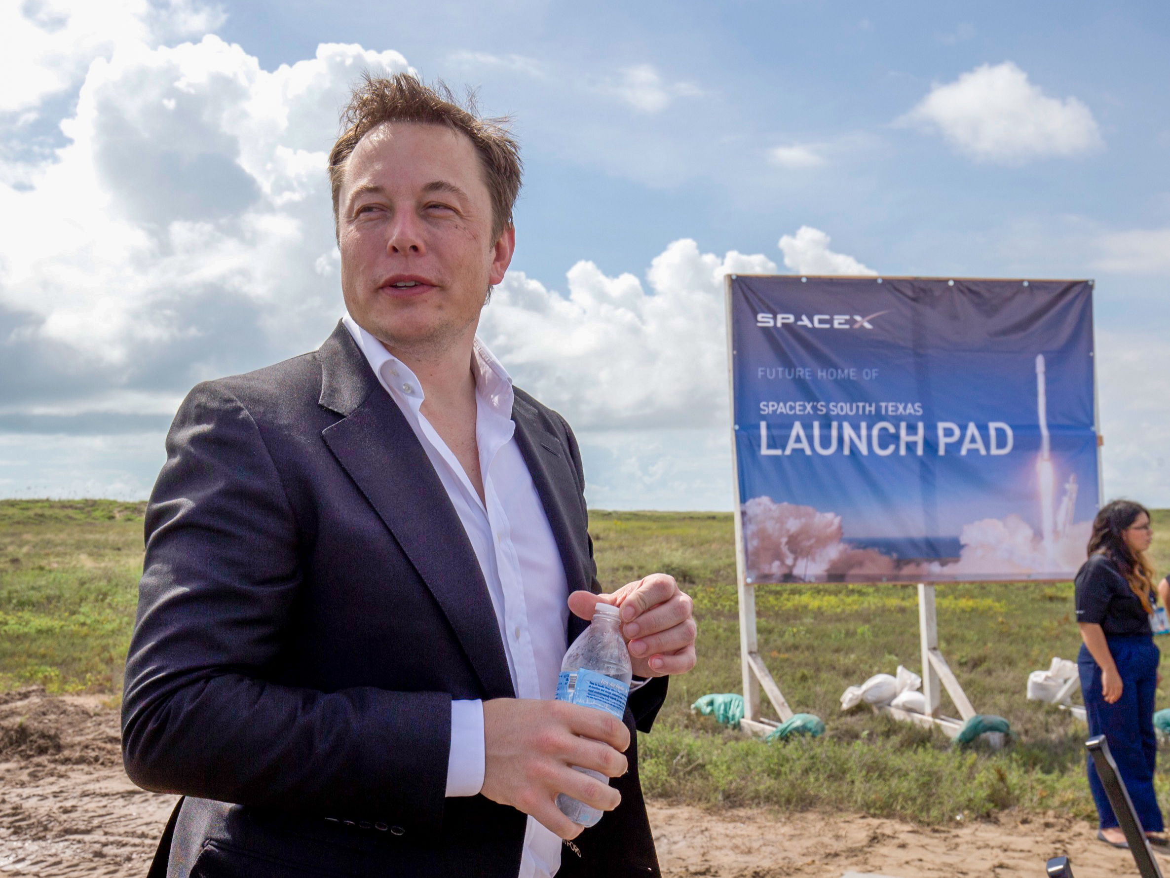 elon musk spacex south texas launch site sign boca chica groundbreaking event september 2014 GettyImages 539719466 edited