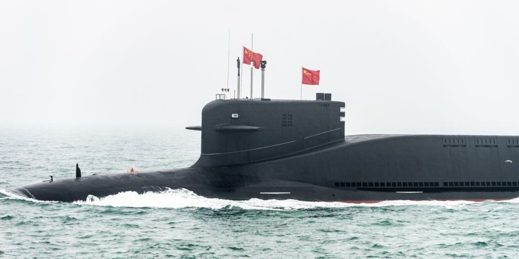 The Jin-B Project 094B ballistic missile submarine takes part in a military parade marking the 70th anniversary of the founding of China's Navy, in the Yellow Sea