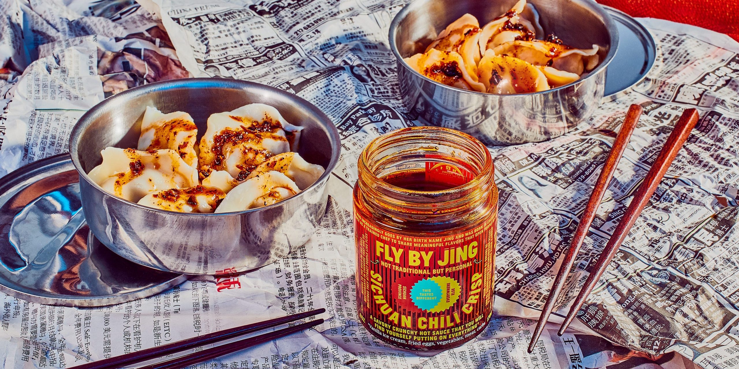 Fly By Jing chili crisp sauce with dumplings