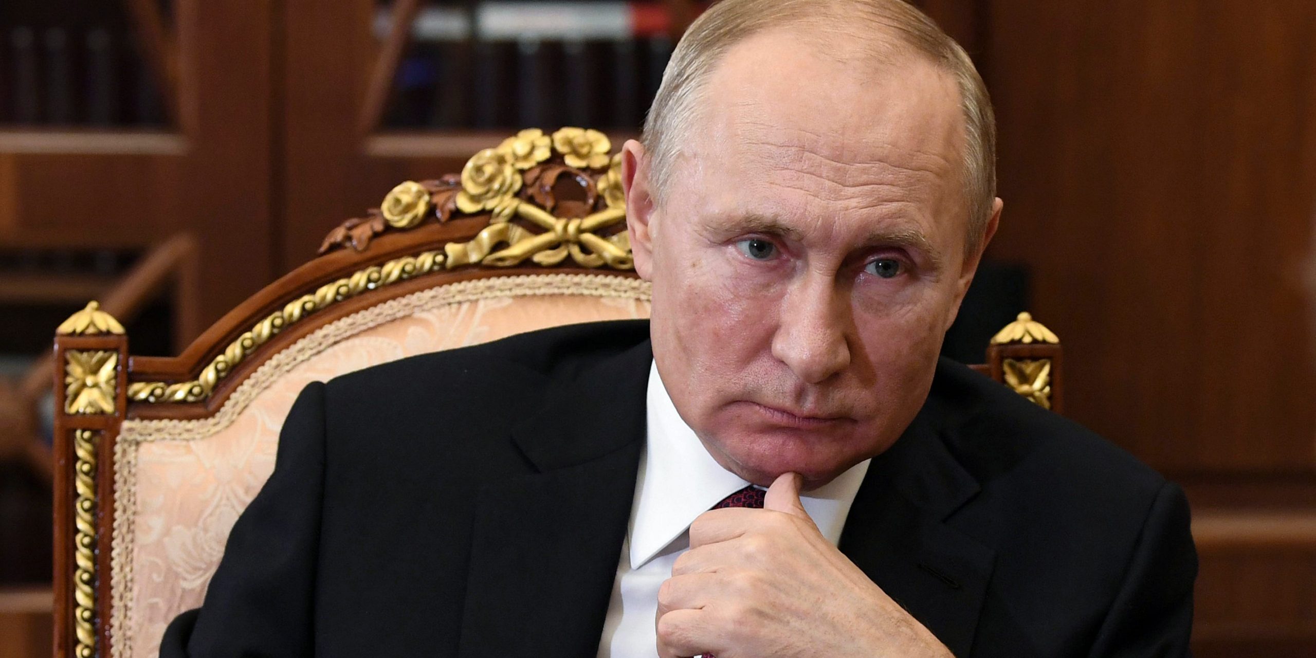 Russian President Vladimir Putin listens during a meeting in the Kremlin, in Moscow, Russia, Thursday, Nov. 19, 2020. (Alexei Nikolsky, Sputnik, Kremlin Pool Photo via AP)