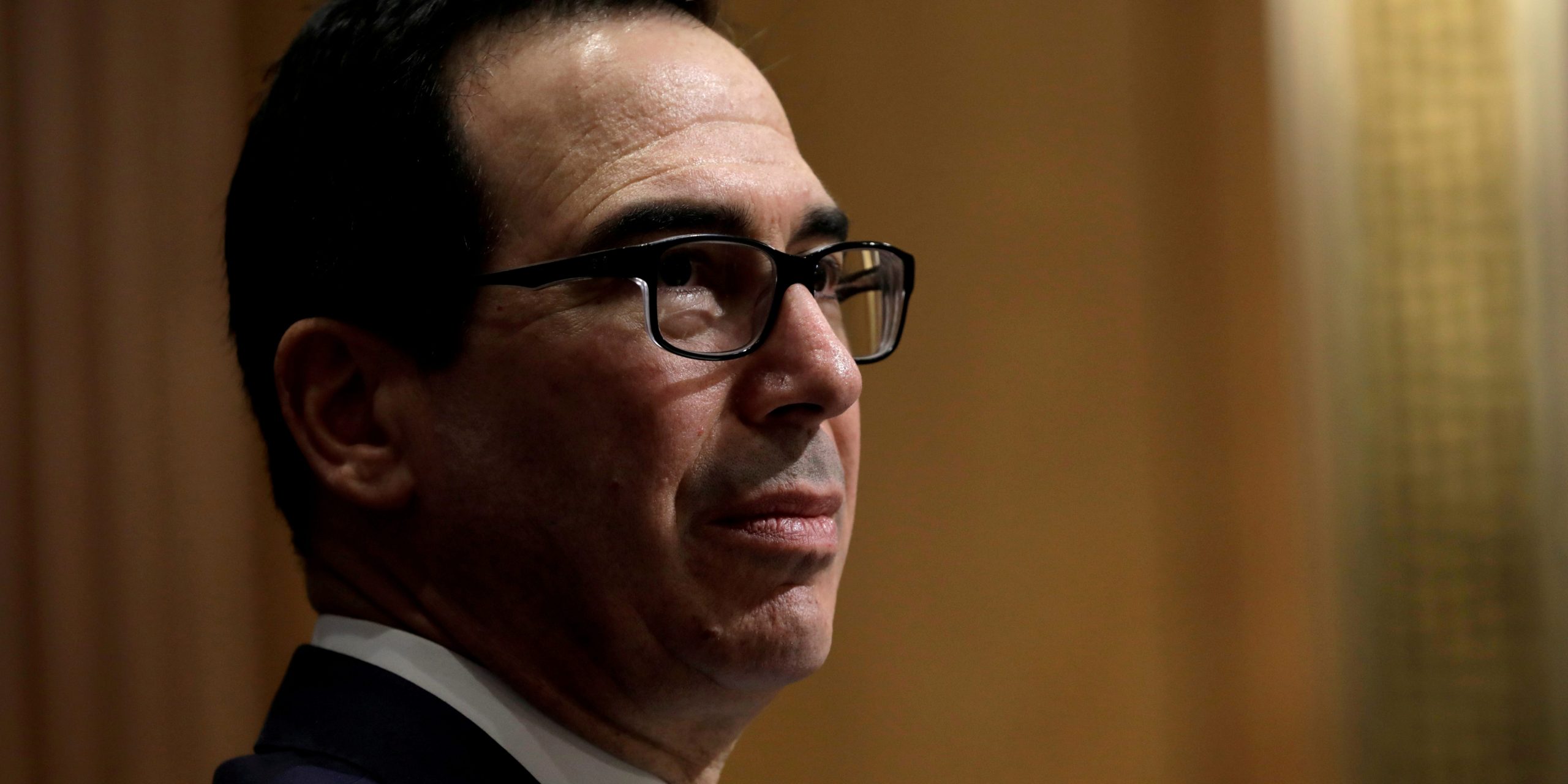 FILE PHOTO: U.S. Treasury Secretary Steven Mnuchin testifies before a Senate Finance Committee hearing on the President's FY2021 Budget on Capitol Hill in Washington, U.S., February 12, 2020. REUTERS/Yuri Gripas/File Photo