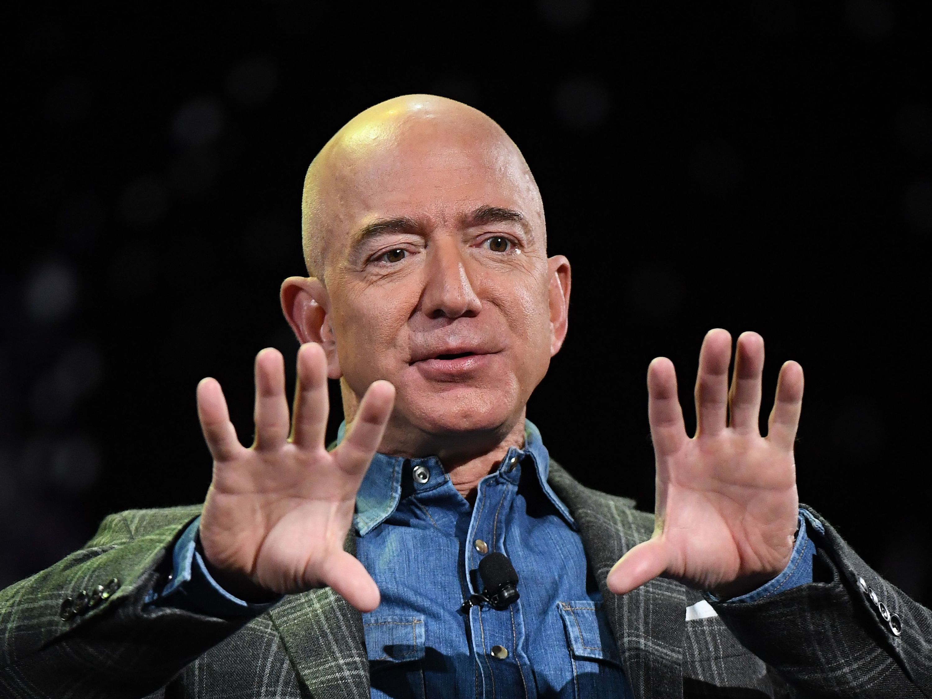 Amazon Founder and CEO Jeff Bezos addresses the audience during a keynote session at the Amazon Re:MARS conference on robotics and artificial intelligence at the Aria Hotel in Las Vegas, Nevada on June 6, 2019.