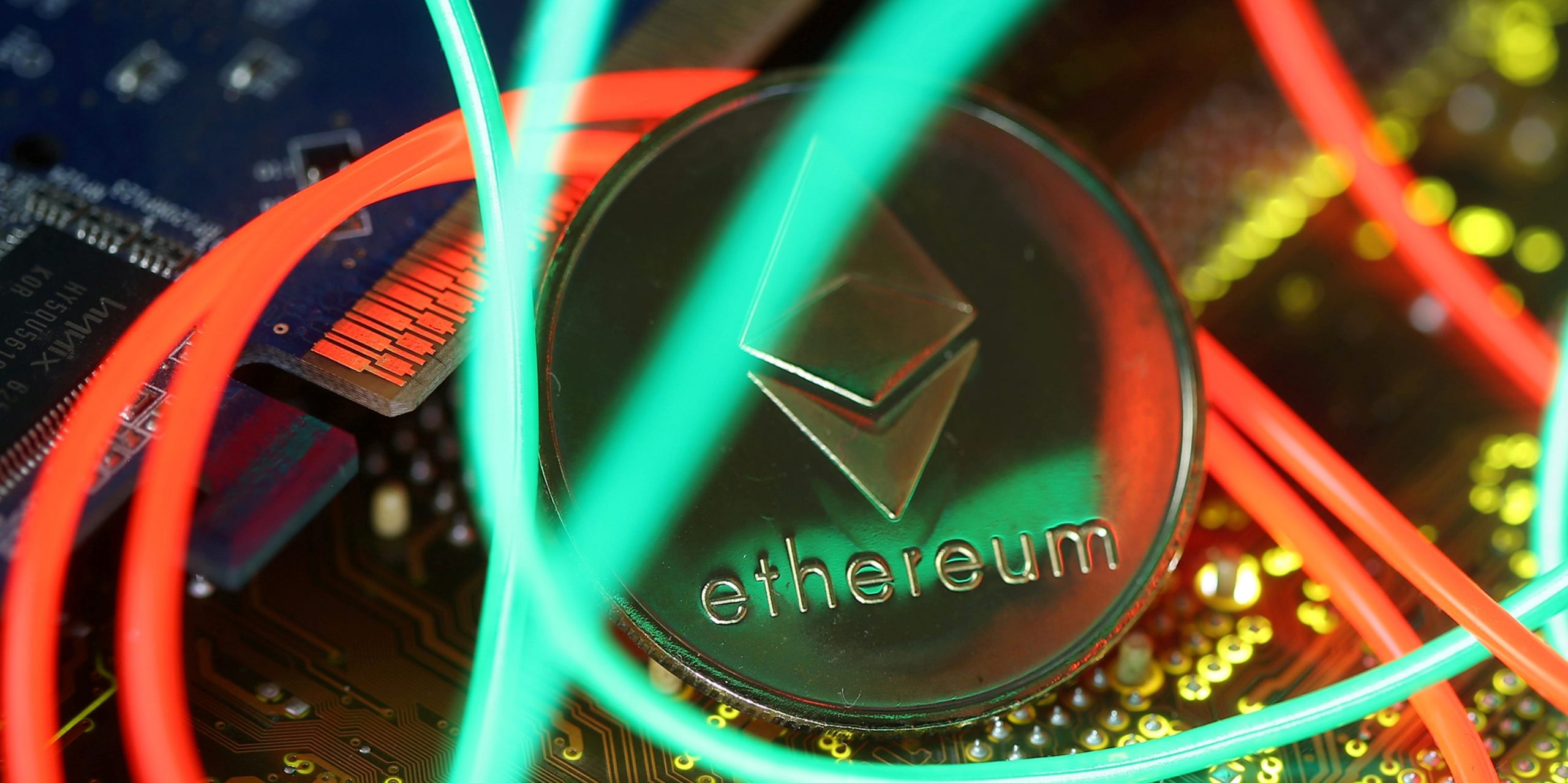 FILE PHOTO: Representation of the Ethereum virtual currency standing on the PC motherboard are seen in this illustration picture, February 3, 2018. REUTERS/Dado Ruvic/Illustration/File Photo