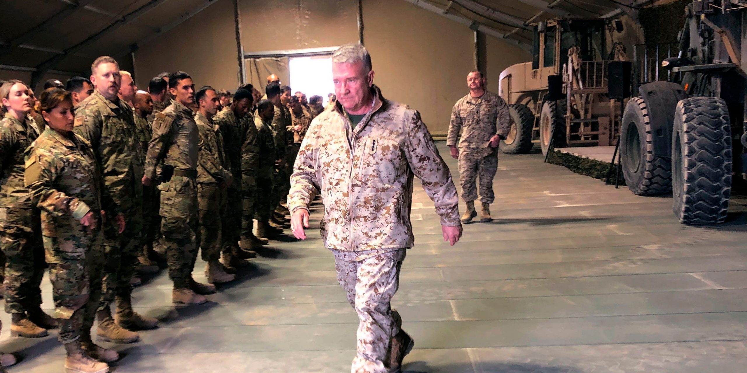 Marine Gen. Frank McKenzie, the top U.S. commander for the Middle East, meets with troops at Prince Sultan Air Base in Saudi Arabia, Wednesday, Jan. 29, 2019, where America has recently deployed fighter jets, Patriot missile batteries, troops and other systems. (AP Photos/Lolita Baldor)