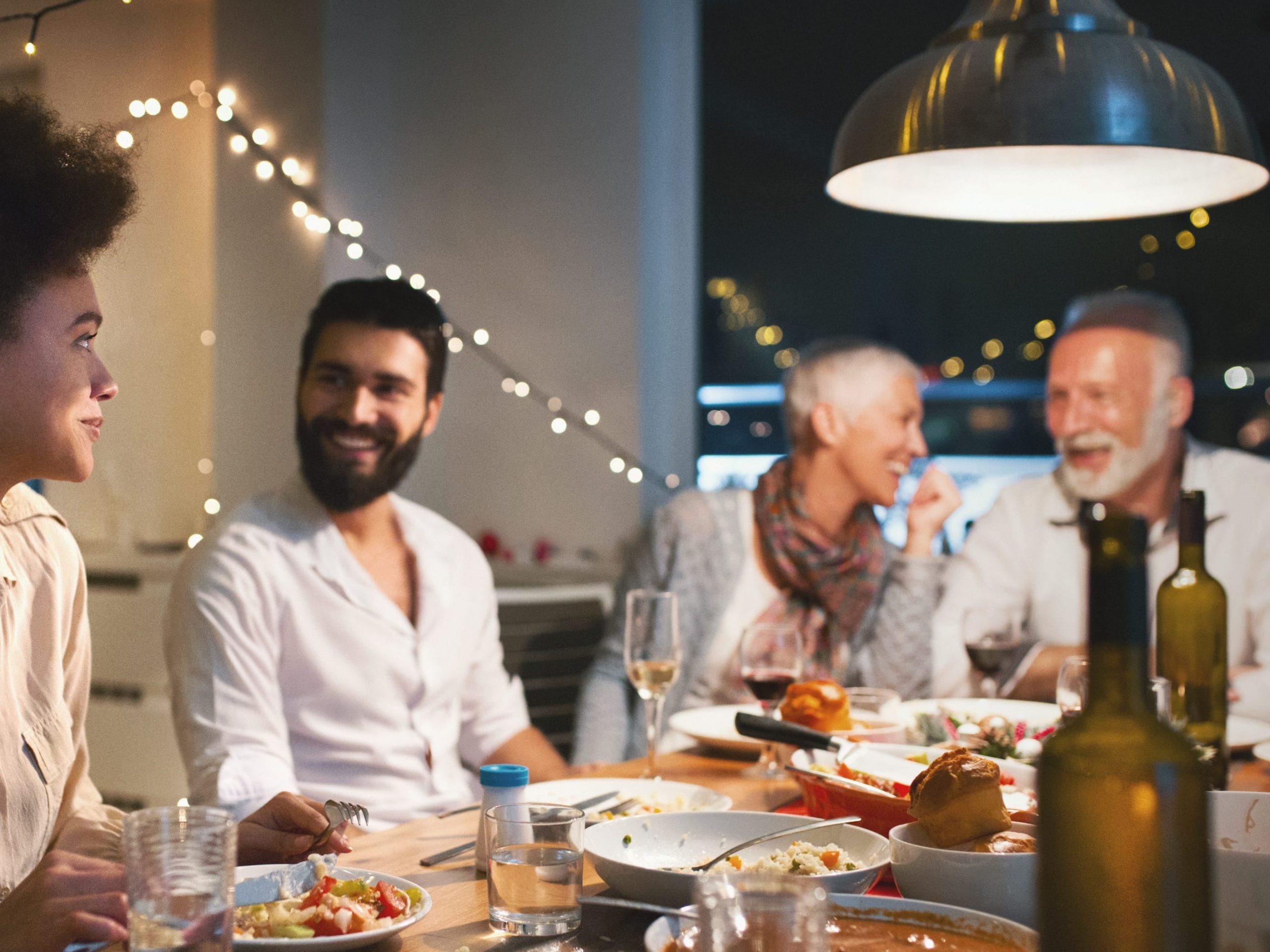 Family talking thanksgiving dinner