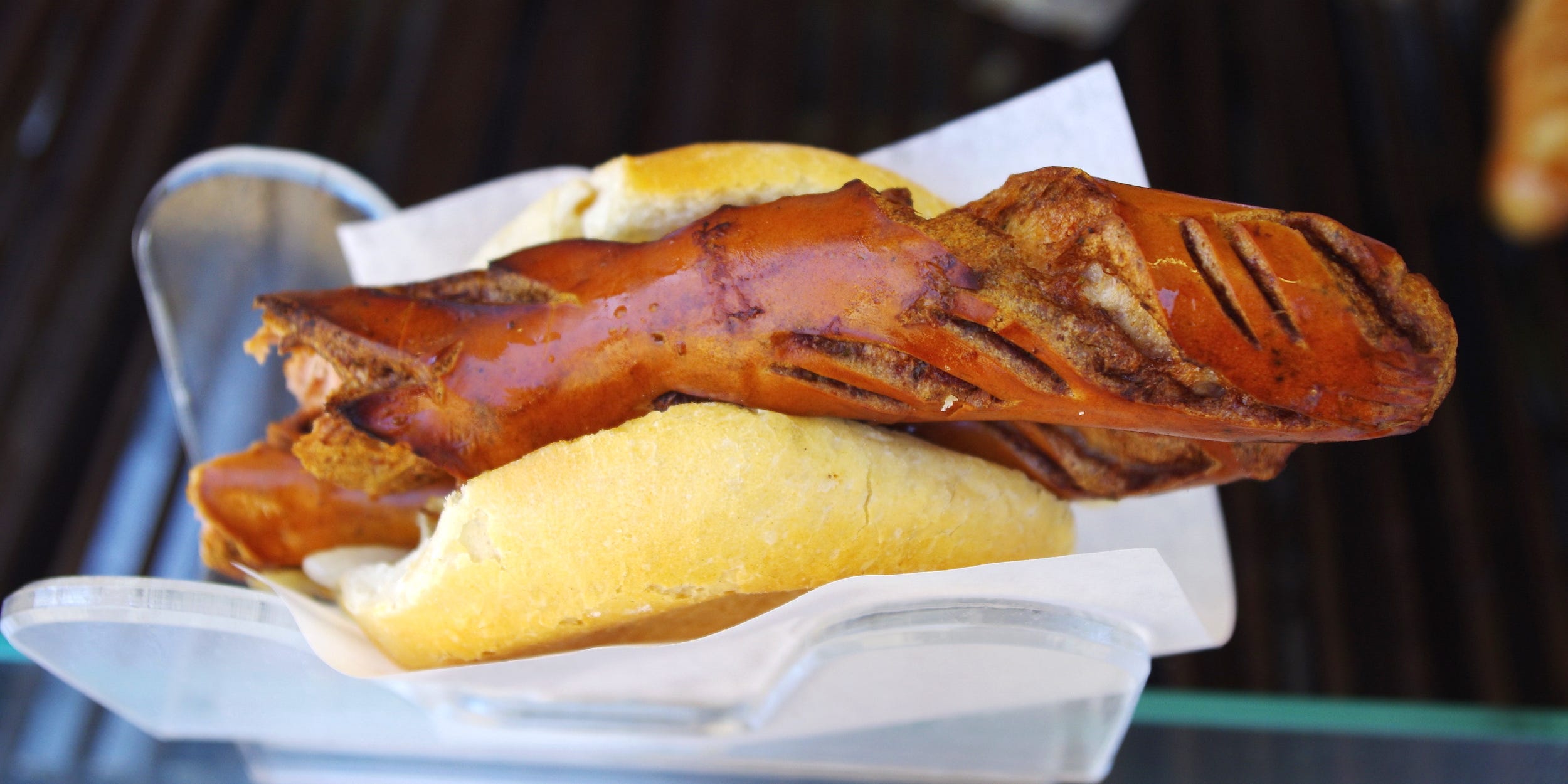 Close-Up Of Eaten Hot Dog On Table