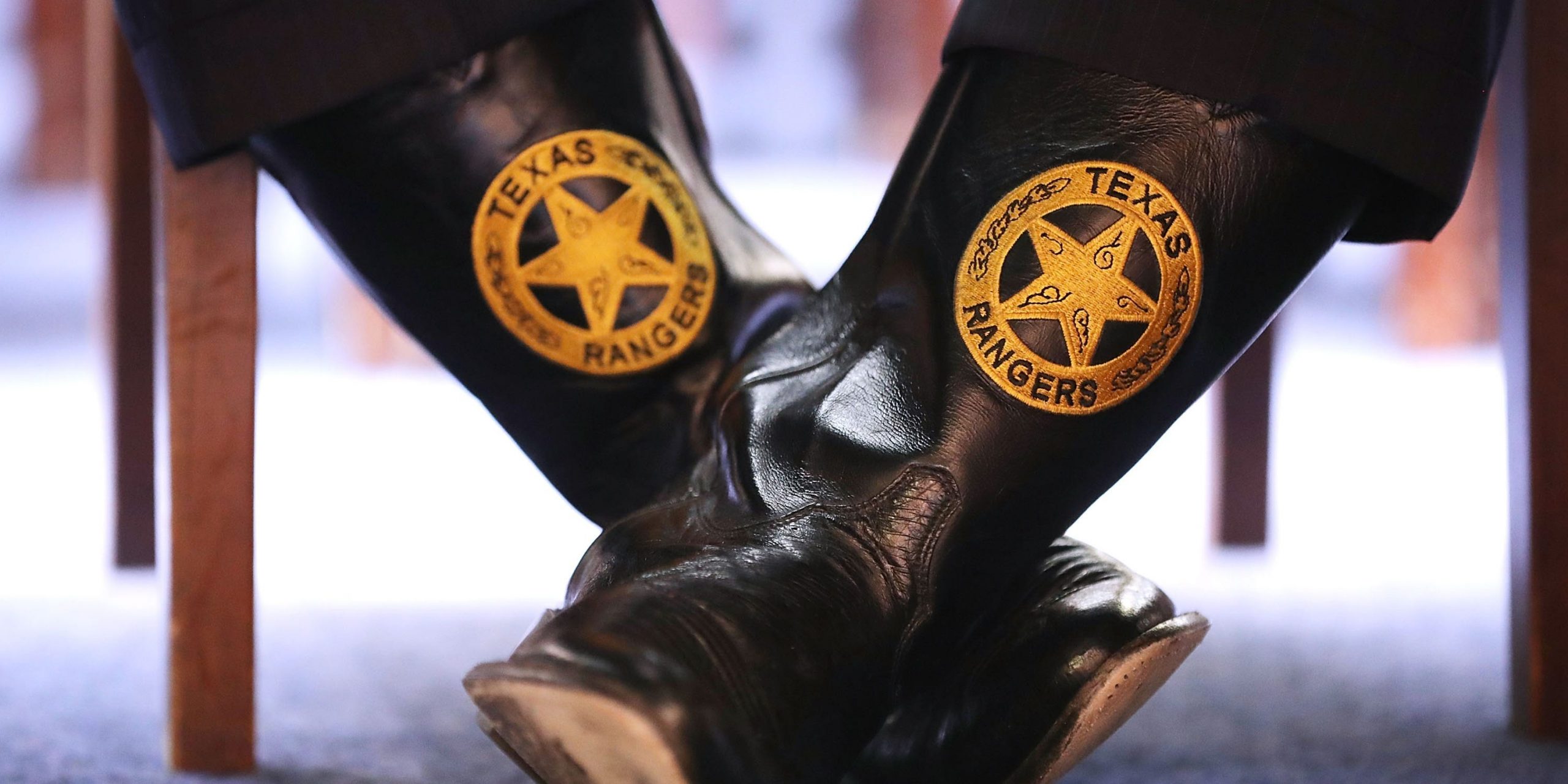 Texas Department of Public Safety Director Steven McCraw wears boots with the Texas Rangers seal as he testifies before the House Oversight and Government Reform Committee's National Security Subcommittee in the Rayburn House Office Building on Capitol Hill April 12, 2018 in Washington, DC.