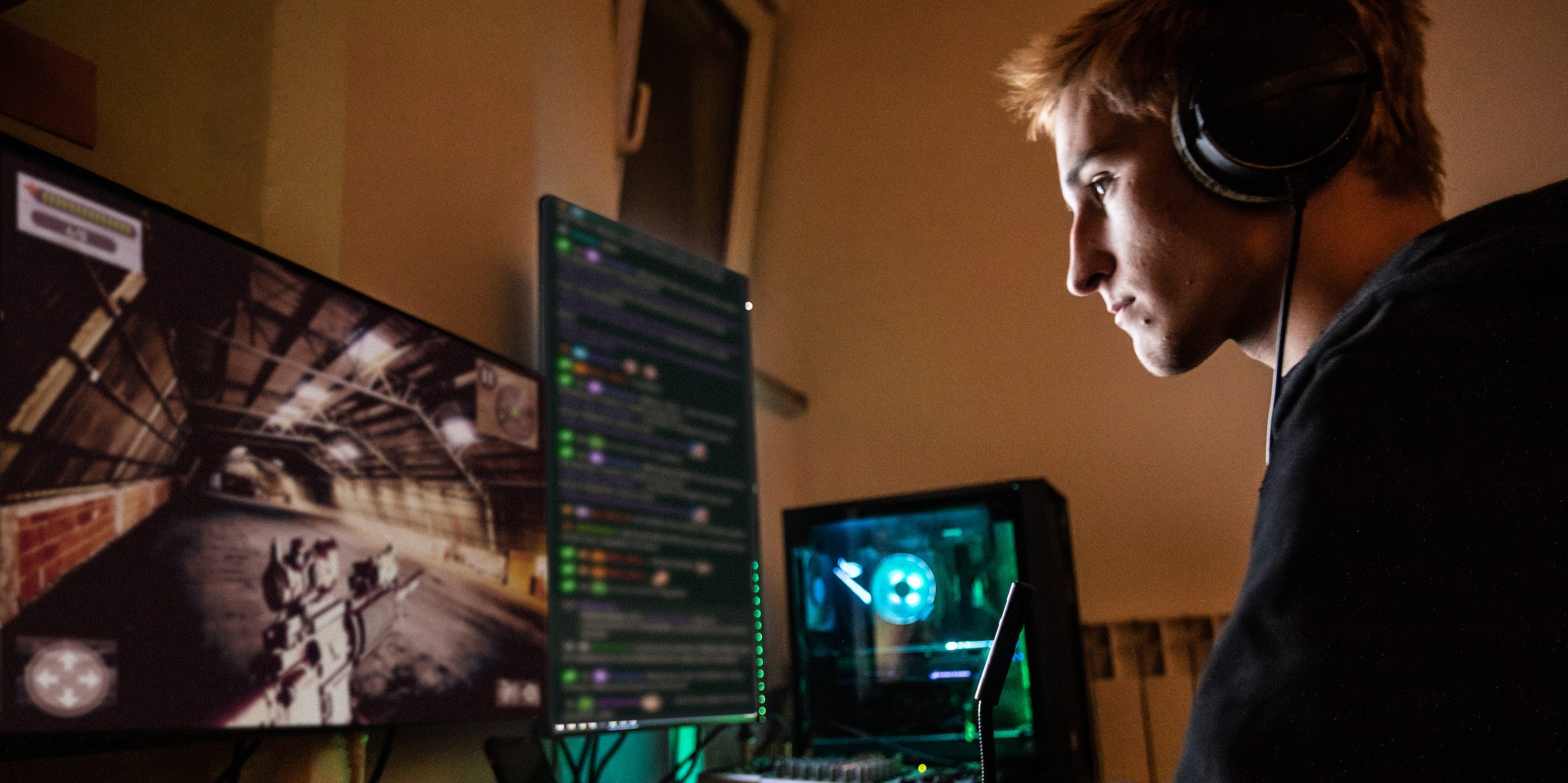 teen playing desktop computer games