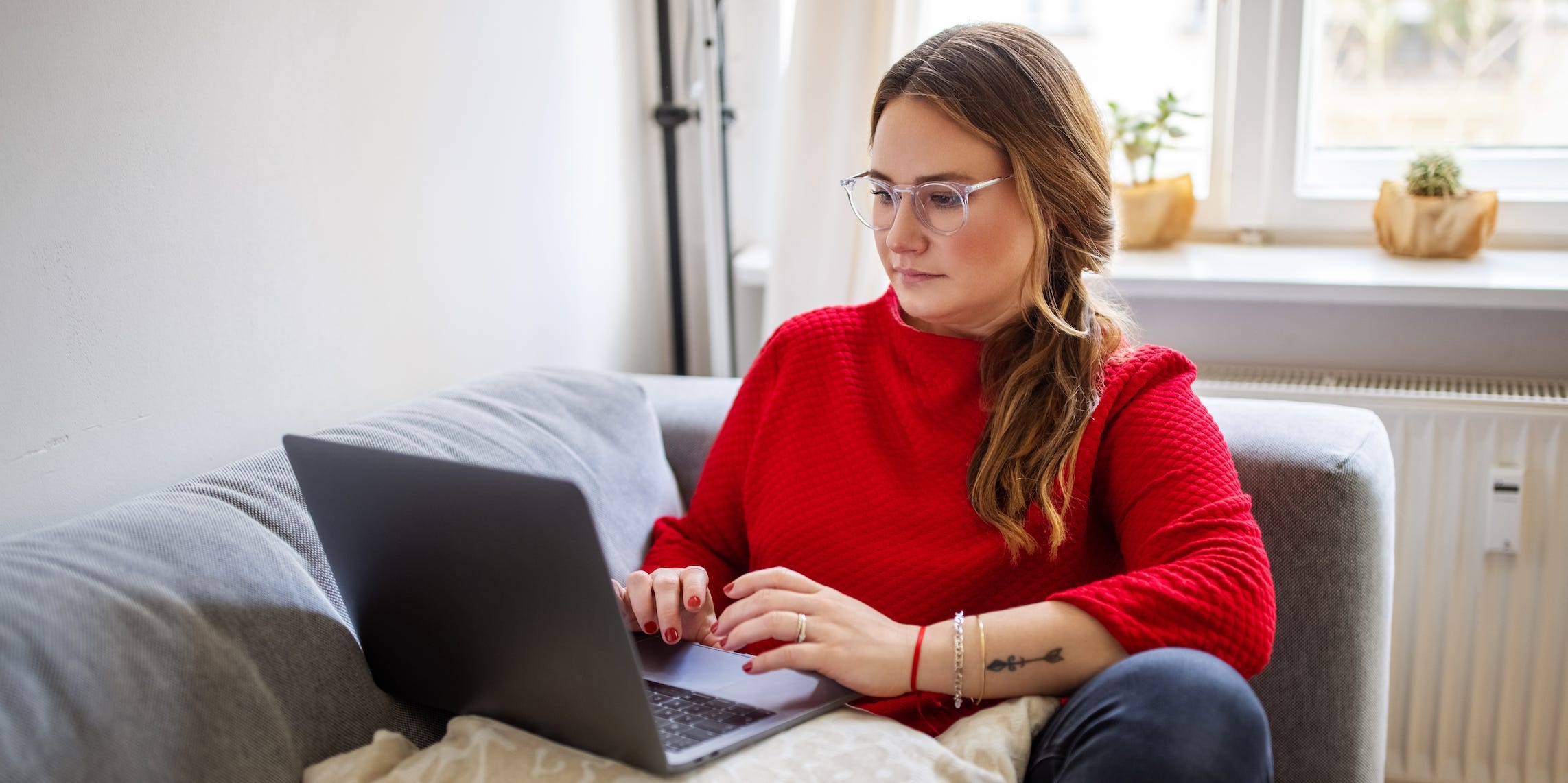 using laptop at home typing